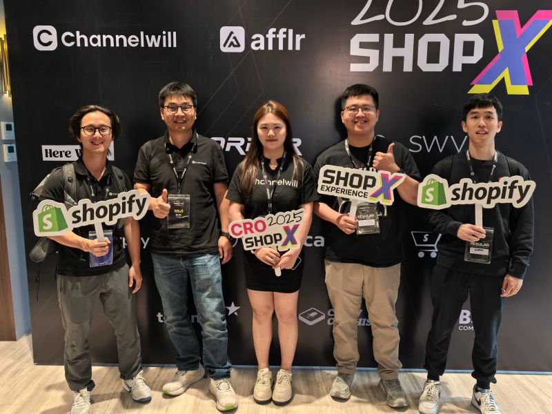 Group photo with the ShopX 2025 backdrop